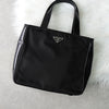 プラダ ナイロン / レザー ハンドバッグ トライアングルロゴ ブラック