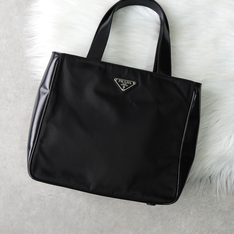 プラダ ナイロン / レザー ハンドバッグ トライアングルロゴ ブラック