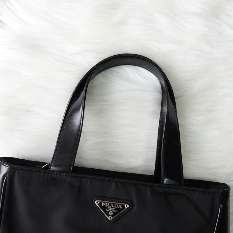 プラダ ナイロン / レザー ハンドバッグ トライアングルロゴ ブラック
