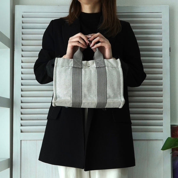 エルメス フールトゥPM キャンバス ハンドバッグ ホワイト / ブラック