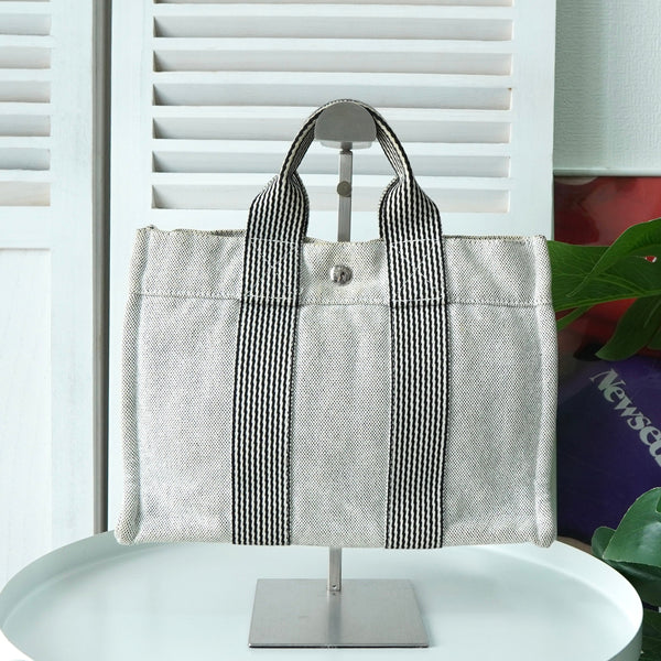 エルメス フールトゥPM キャンバス ハンドバッグ ホワイト / ブラック