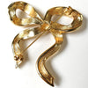 クリスチャン ディオール CDロゴ リボン ブローチ GPゴールド