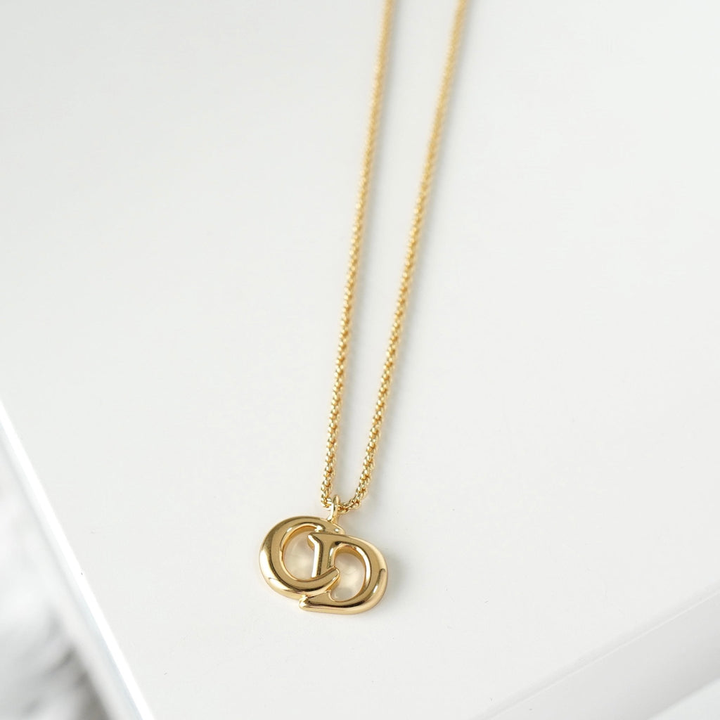 Christian Dior CD logo GP gold necklace, deadstock item with tags