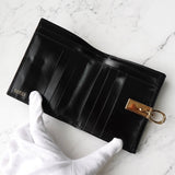 グッチ G金具 レザー 二つ折り財布 ブラック - NEWSED