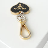 プラダ ハート ロゴ チャーム キーリング GPゴールド / ブラック 箱付き - NEWSED