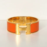 エルメス クリッククラックH PM バングル ゴールド/オレンジ 箱付き - NEWSED