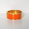 Hermes Click-Clack H PM Bangle Gold/Orange