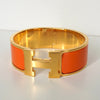 エルメス クリッククラックH PM バングル ゴールド/オレンジ 箱付き