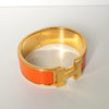 Hermes Click-Clack H PM Bangle Gold/Orange
