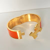 Hermes Click-Clack H PM Bangle Gold/Orange