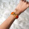 Hermes Click-Clack H PM Bangle Gold/Orange