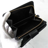 プラダ サフィアーノ レザー 二つ折り財布 コンパクトウォレット トライアングルロゴ L字ファスナー ブラック - NEWSED