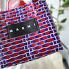 Logo basket hand bag