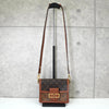 Louis Vuitton Monogram Reverse Dauphine 迷你单肩包，内置 IC 芯片，棕色