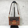 Louis Vuitton Monogram Reverse Dauphine 迷你单肩包，内置 IC 芯片，棕色