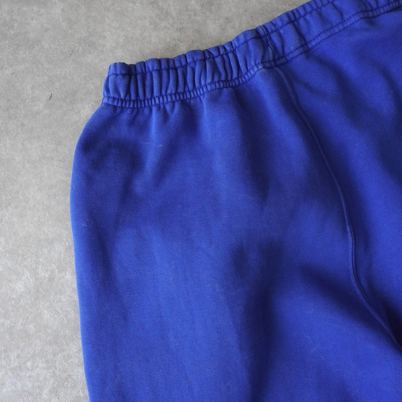 ステューシー × ナイキ NRG ゲームロワイヤル ロゴ スウェットパンツ トレーニングパンツ ブルー - NEWSED