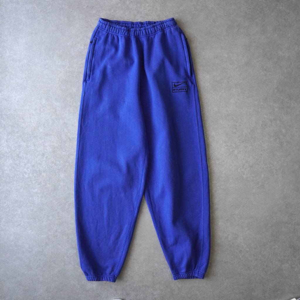 ステューシー × ナイキ NRG ゲームロワイヤル ロゴ スウェットパンツ トレーニングパンツ ブルー