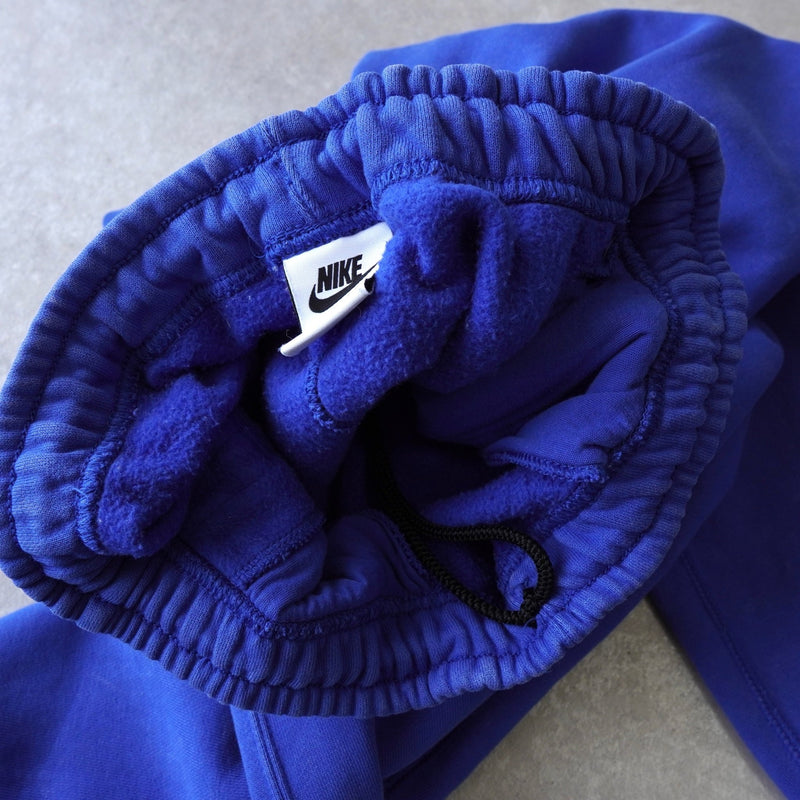 ステューシー × ナイキ NRG ゲームロワイヤル ロゴ スウェットパンツ トレーニングパンツ ブルー - NEWSED