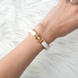 エルメス クリッククラックPM バングル GP ゴールド / ホワイト 箱付き - NEWSED