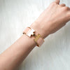 Hermès Click-Clack PM Bangle in Grand Prix Gold/Pink