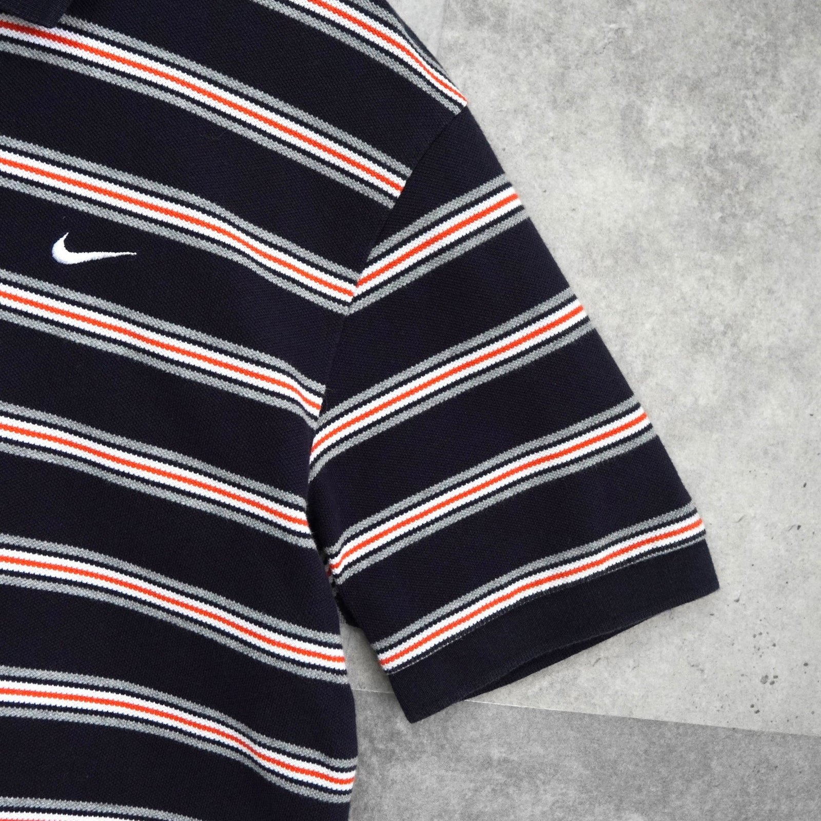 / ブラック 半袖ポロシャツ ボーダー ナイキ ボーダー半袖ポロシャツ　黒　フェード　古着　used NIKE 8SM1 オレンジ ブランド古着 | メンズウェア