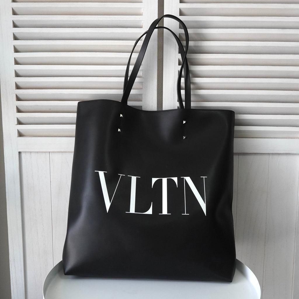 Valentino 徽标黑色皮革托特包