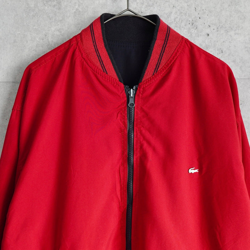 ラコステ ヴィンテージ リバーシブル スタジャン ブルゾン ロゴパッチ ダークネイビー/レッド - NEWSED