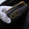 Prada 尼龙和 Saffiano 皮革托特包，带黑色和金色三角形徽标