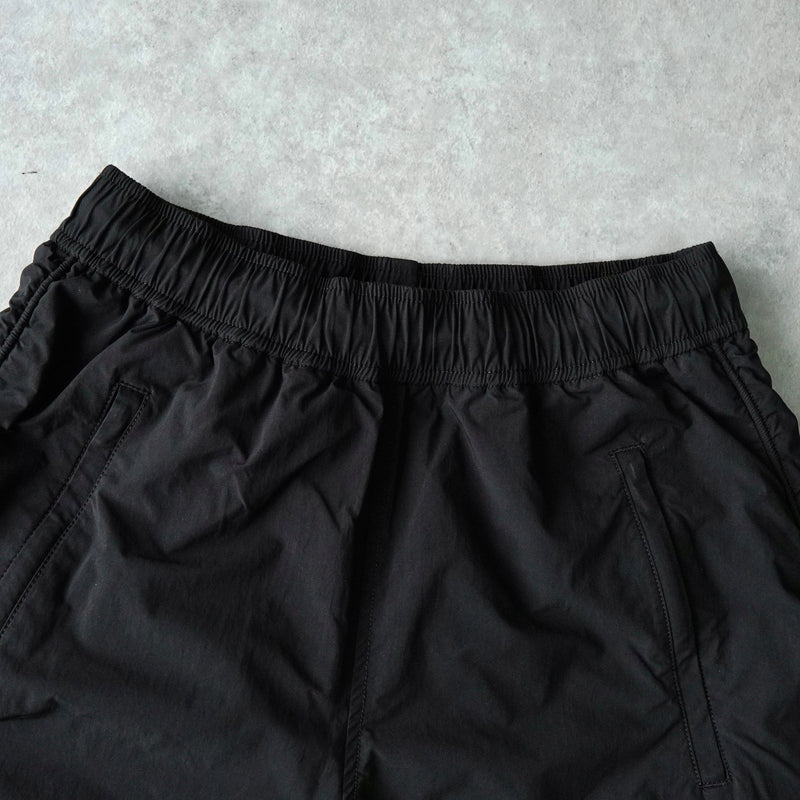 アレキサンダー ワン ロゴ シャーリング ナイロンパンツ トラックパンツ ブラック - NEWSED