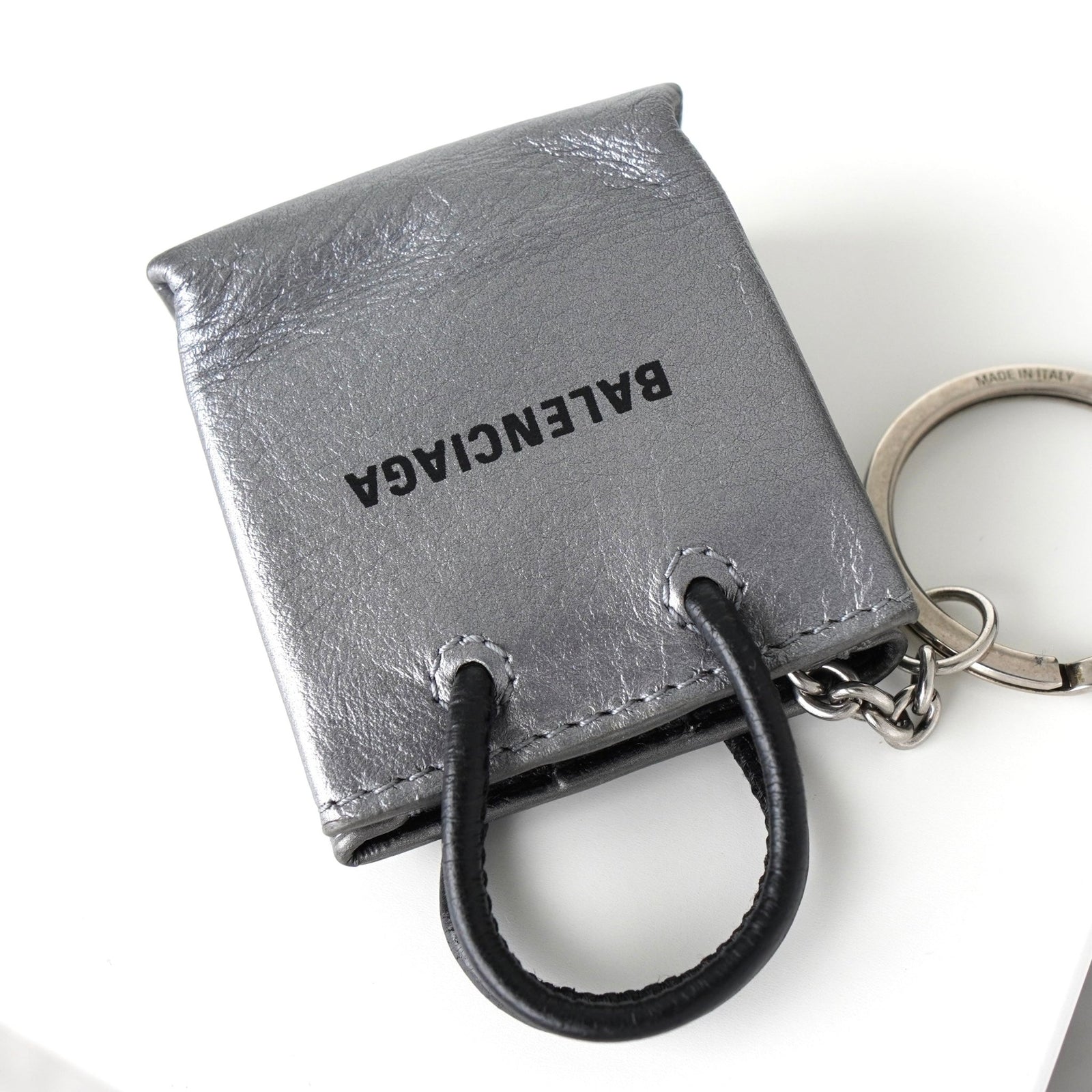 Balenciaga bag motif logo leather keychain charm in silver