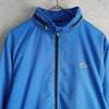 ラコステ ナイロンジャケットトラックジャケット ロゴパッチ ブルー