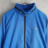 ラコステ ナイロンジャケットトラックジャケット ロゴパッチ ブルー - NEWSED