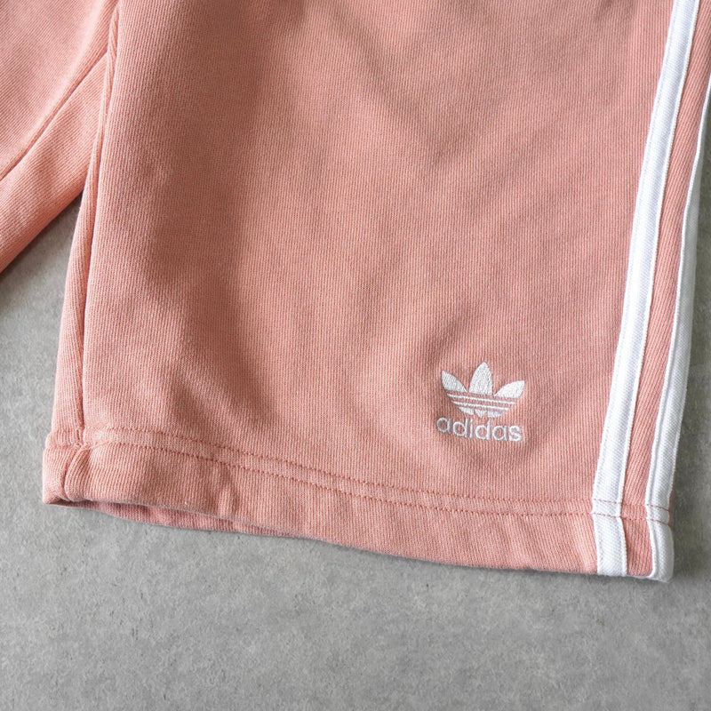 アディダス トレフォイルロゴ ショート スウェットパンツ サーモンピンク - NEWSED