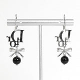 クリスチャン ディオール ロゴ ラインストーン リボン ピアス シルバー / ブラック - NEWSED