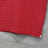 Nike 条纹徽标短袖 Polo 衫（红色）