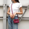 Prada Saffiano 皮革三角形徽标迷你单肩包（紫色）