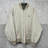 ラコステ リバーシブル ロゴパッチ チェック柄 スウィングトップ ブルゾン オフホワイト / カーキ - NEWSED