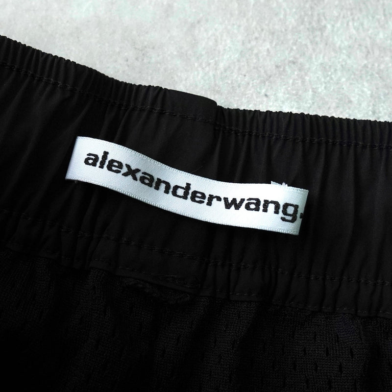 アレキサンダー ワン ロゴ シャーリング ナイロンパンツ トラックパンツ ブラック - NEWSED