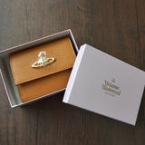 ヴィヴィアン・ウエストウッド オーブ レザー 三つ折り財布 キャメル 箱付き 未使用品 - NEWSED