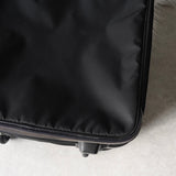 プラダ テスート ポコノ ナイロン / サフィアーノレザー トライアングルロゴ / キャリーバッグ ブラック - NEWSED