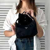 プラダ ポコノ テスート ナイロン ミニハンドバッグ アクセサリーポーチ ブラック - NEWSED