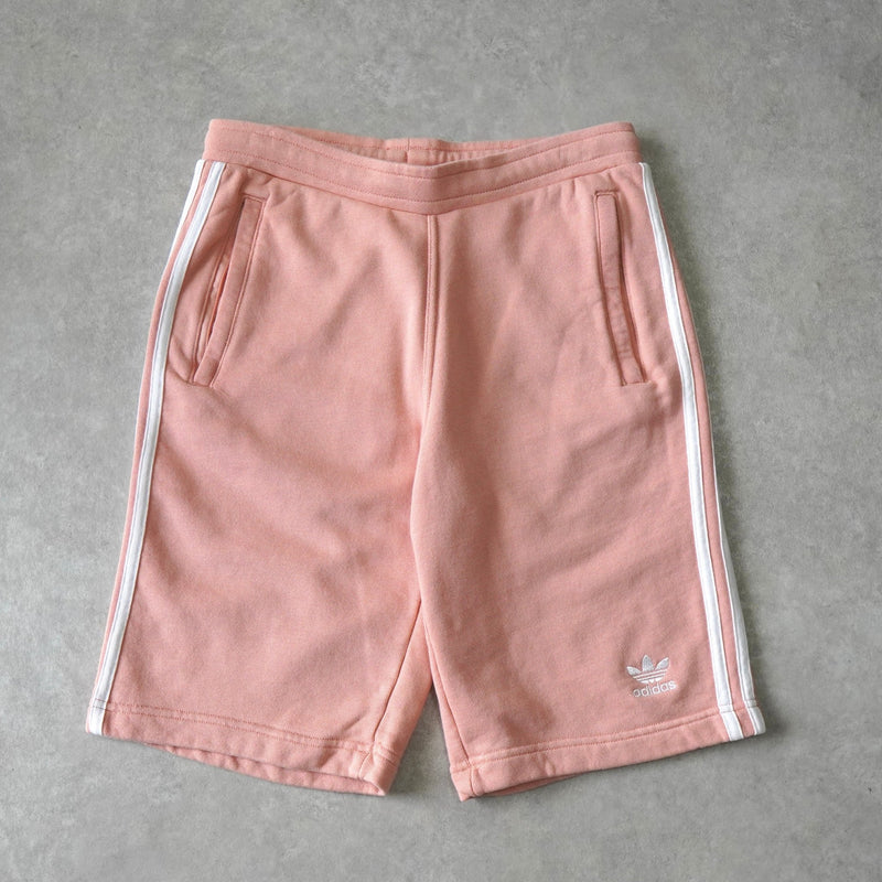 アディダス トレフォイルロゴ ショート スウェットパンツ サーモンピンク - NEWSED