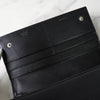 Prada nylon bifold wallet with triangle logo in black