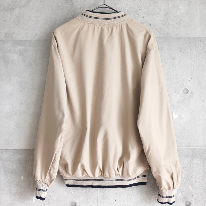 ラコステ リバーシブル ブルゾン スタジャン ロゴパッチ ダークネイビー/ベージュ - NEWSED