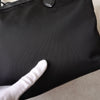 Prada 尼龙和 Saffiano 皮革托特包，带黑色和金色三角形徽标