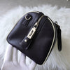 Prada Saffiano 皮革迷你波士顿包，带三角形徽标（黑色/白色）