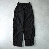 アレキサンダー ワン ロゴ シャーリング ナイロンパンツ トラックパンツ ブラック - NEWSED