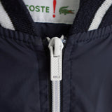 ラコステ ナイロン スタジャン ブルゾン ロゴパッチ ネイビー - NEWSED
