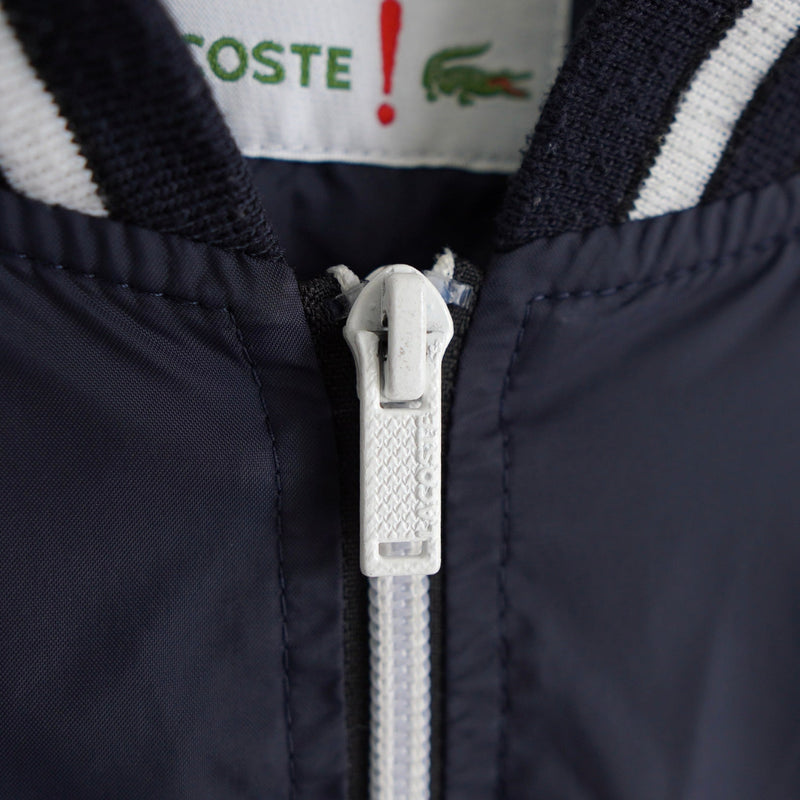 ラコステ ナイロン スタジャン ブルゾン ロゴパッチ ネイビー - NEWSED