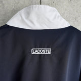 ラコステ ナイロンジャケット ロゴパッチ ダークネイビー/ホワイト - NEWSED